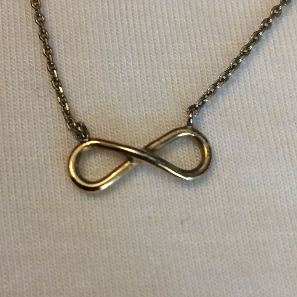 Choker style necklace with infinity symbol